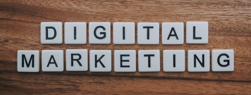 digital marketing artwork on brown wooden surface