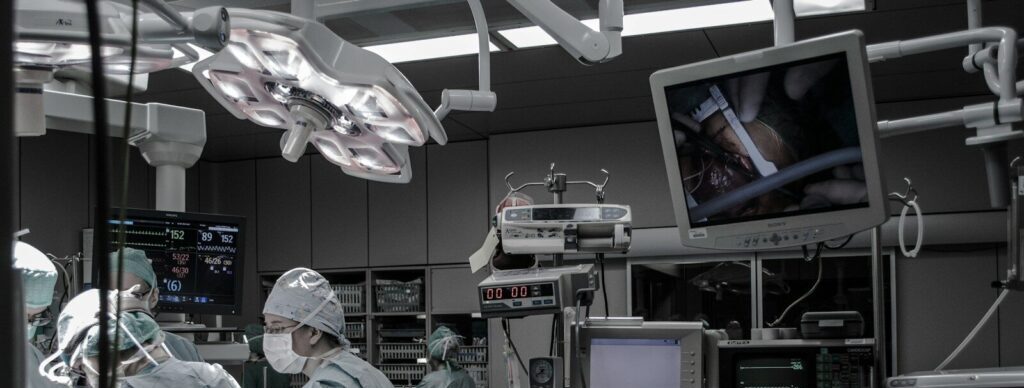 people wearing surgical clothes inside operating room
